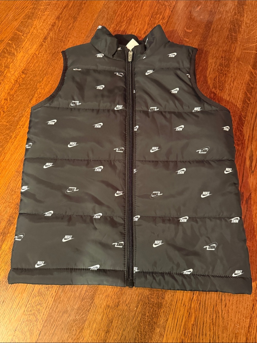 NWOT Nike Black Puffer Vest with Repeat Logo - never worn